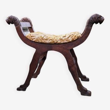 Curule mahogany lion heads stool