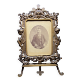 Old photograph of a man in a spelter frame