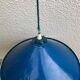 Blue and white painted metal hanging and its mount and drop