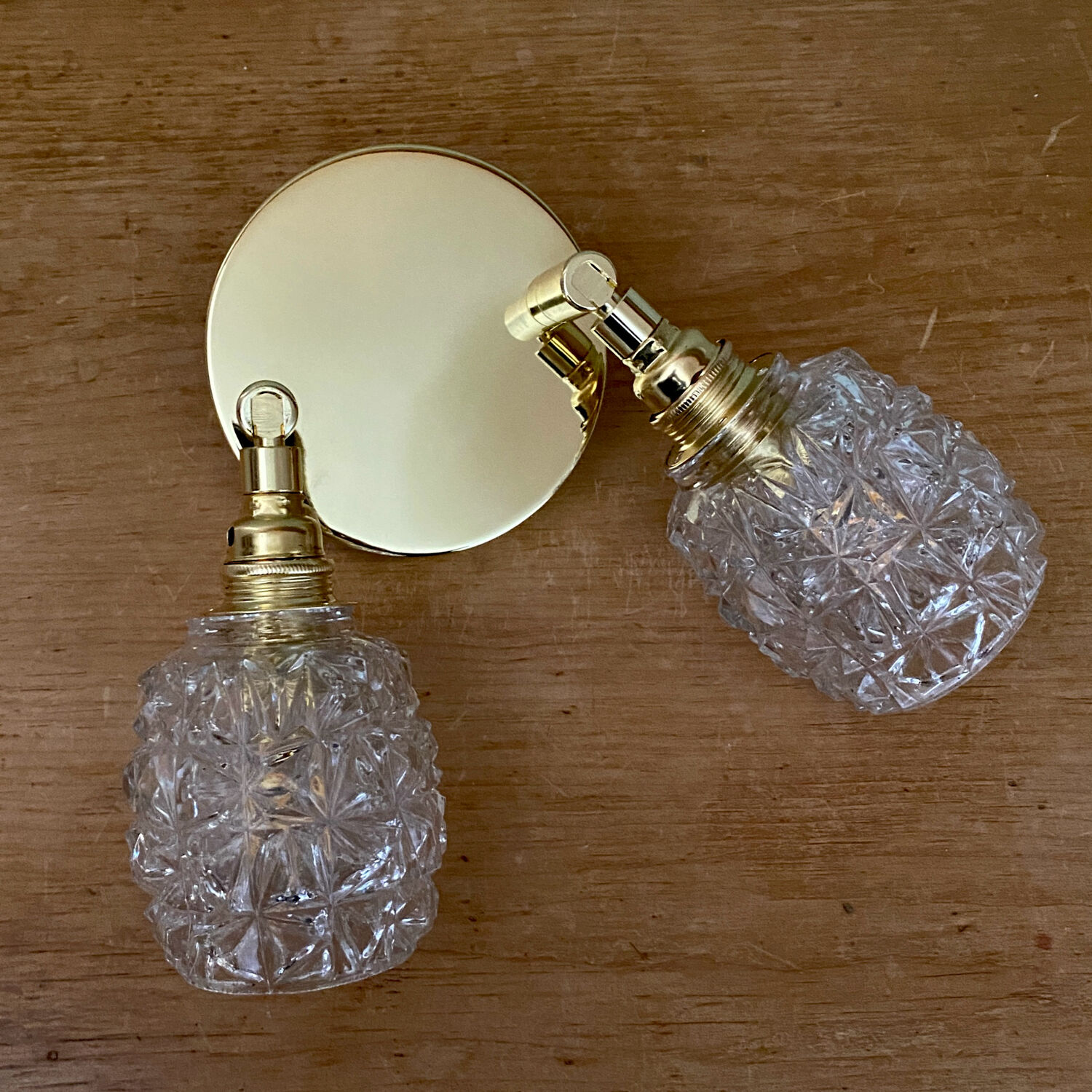 Double vintage tulip wall light in moulded glass.