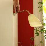 Brass and glass sconce