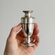 Small soliflore vase in very light metal.