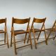Set of 4 folding chairs, vintage design, wooden structure and canned seat. Around 1970