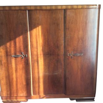 Three-door wardrobe in solid walnut