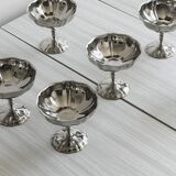 6 silver stainless steel bowls.