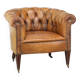 Antique, characteristic sheepskin chesterfield club chair on wheels