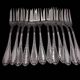 12 silver plated cake forks with case
