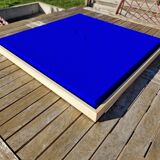 Framed monochrome blue abstract painting.