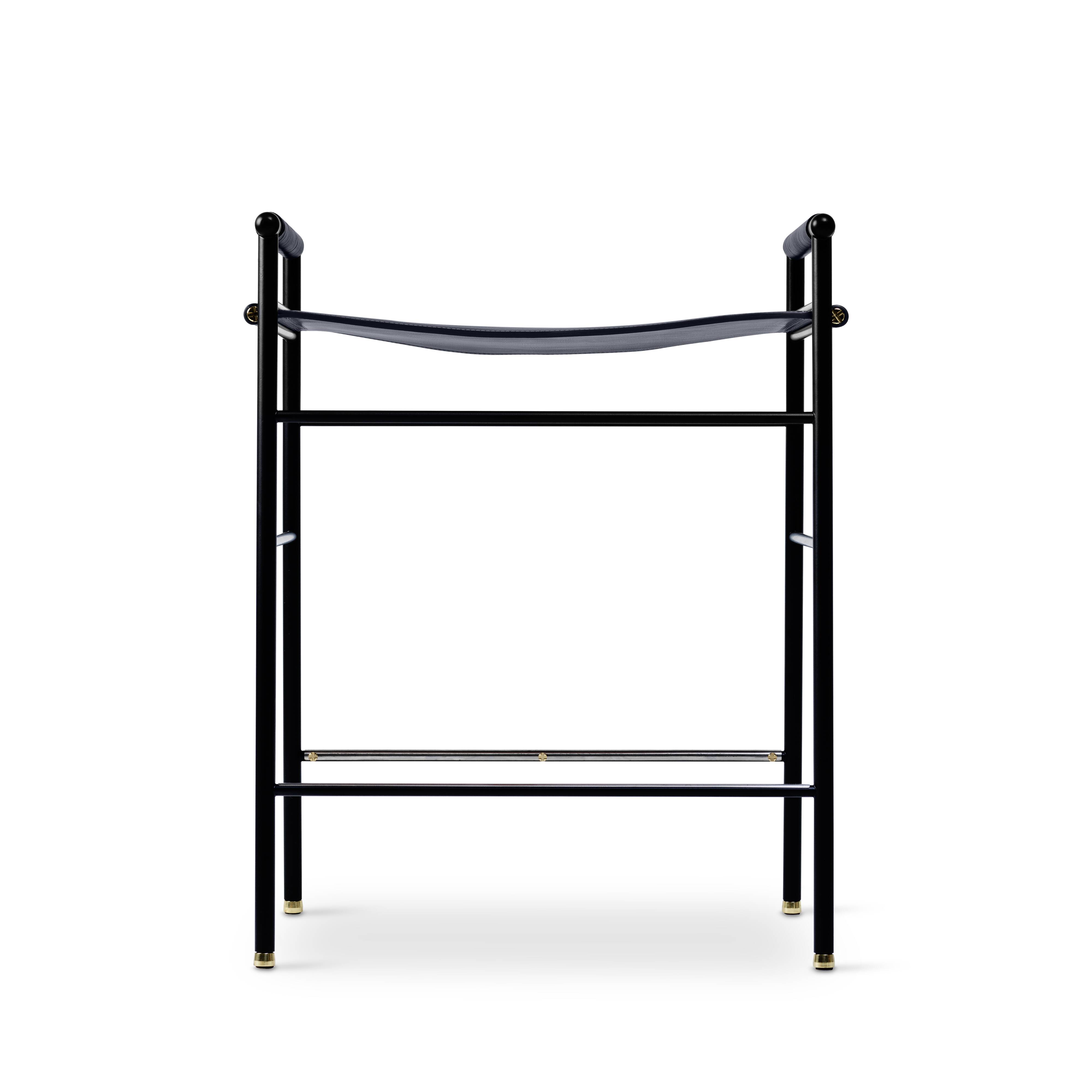 Pair of backless bar stools in blue leather and black metal.