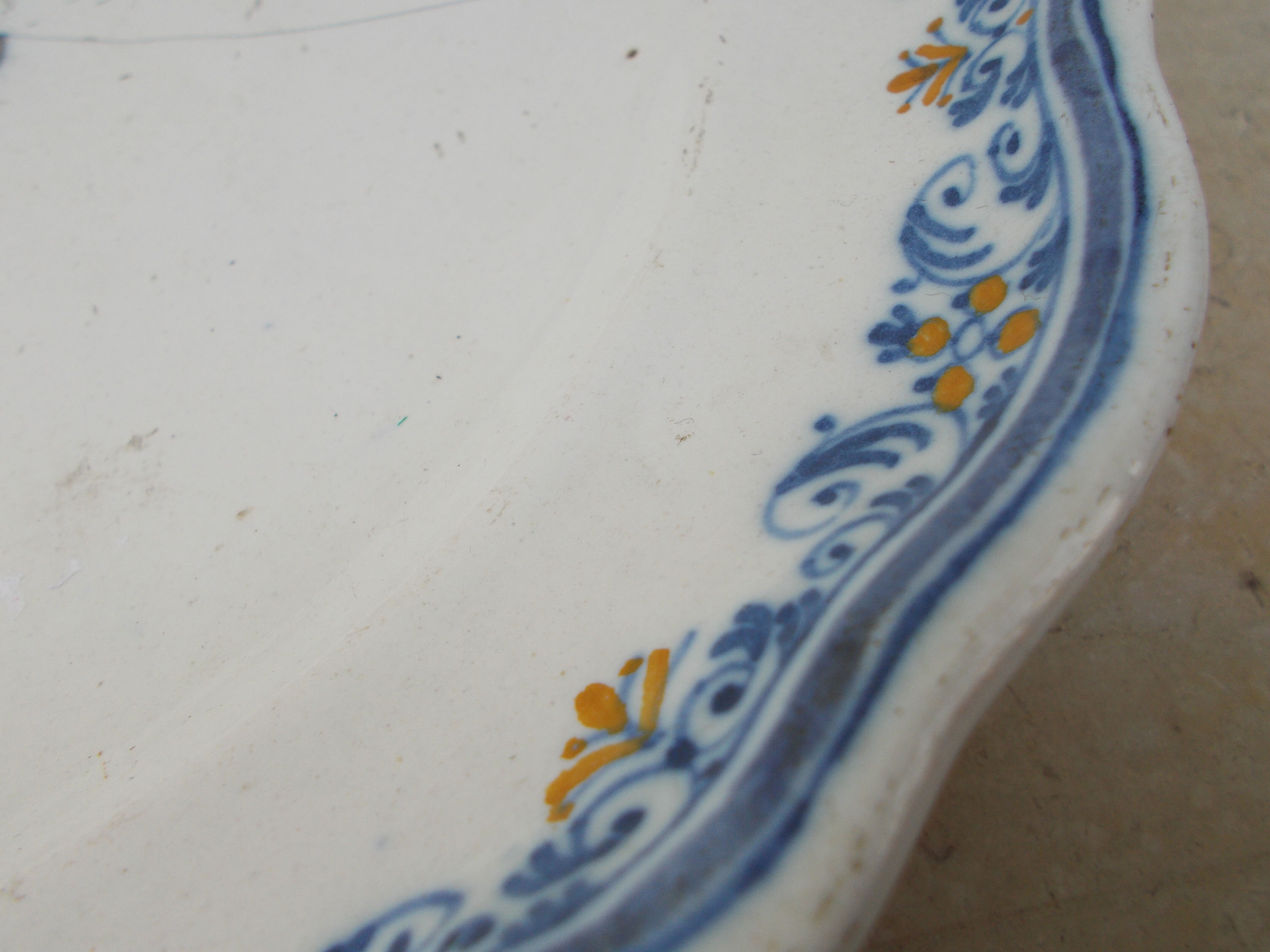 Old faience plate of Moustiers