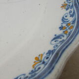 Old faience plate of Moustiers