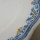 Old faience plate of Moustiers