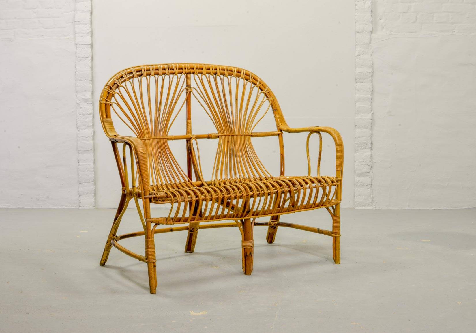 Elegant Rohé Style Vintage Design Rattan Bamboo Two-Seat Patio Sofa, 1950s.