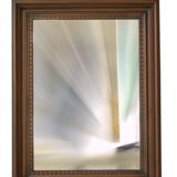 Vertical mirror, bevelled glass and carved wooden frame, 68x88cm