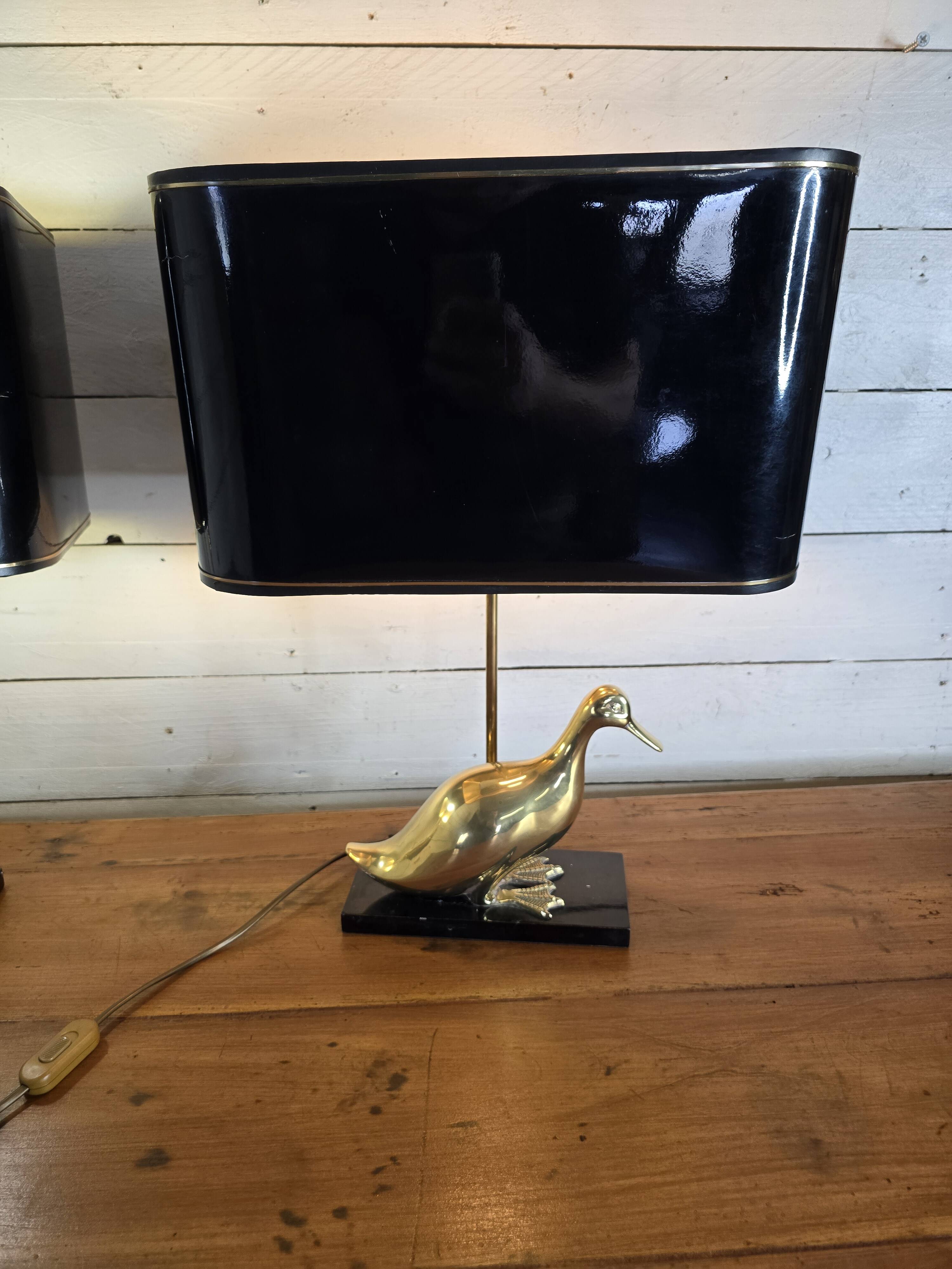 Pair of 70s table lamps featuring a brass duck