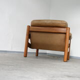 Teak and leather club armchairs