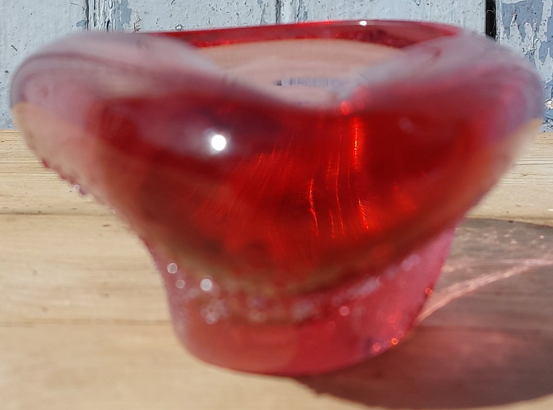 Empty pink blown glass pocket