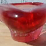 Empty pink blown glass pocket