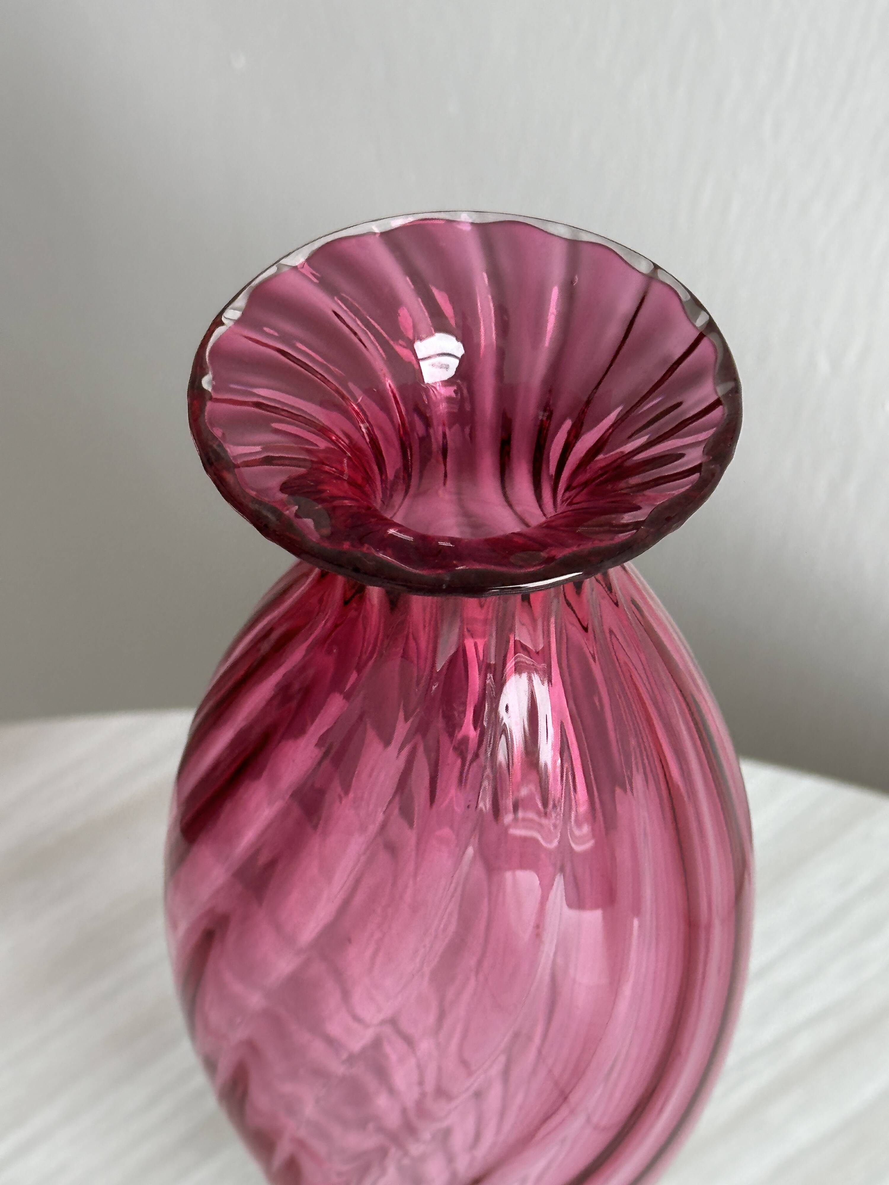 Twisted pink blown glass vase