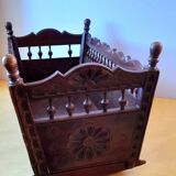 Carved wooden dolls cradle