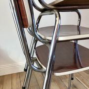 Trio of chairs in light brown formica and cream contour 70s