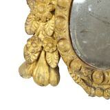 Petit miroir ancien patiné en bois doré du XIXe siècle