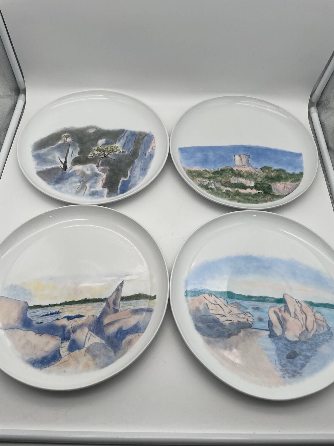 Hand painted porcelain plate with landscape decoration