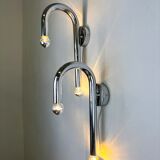 Pair of Space-Age tubular wall lights, chromed metal, Italy, 1970s
