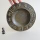 Luxa brass ashtray with zodiac relief and embers killer