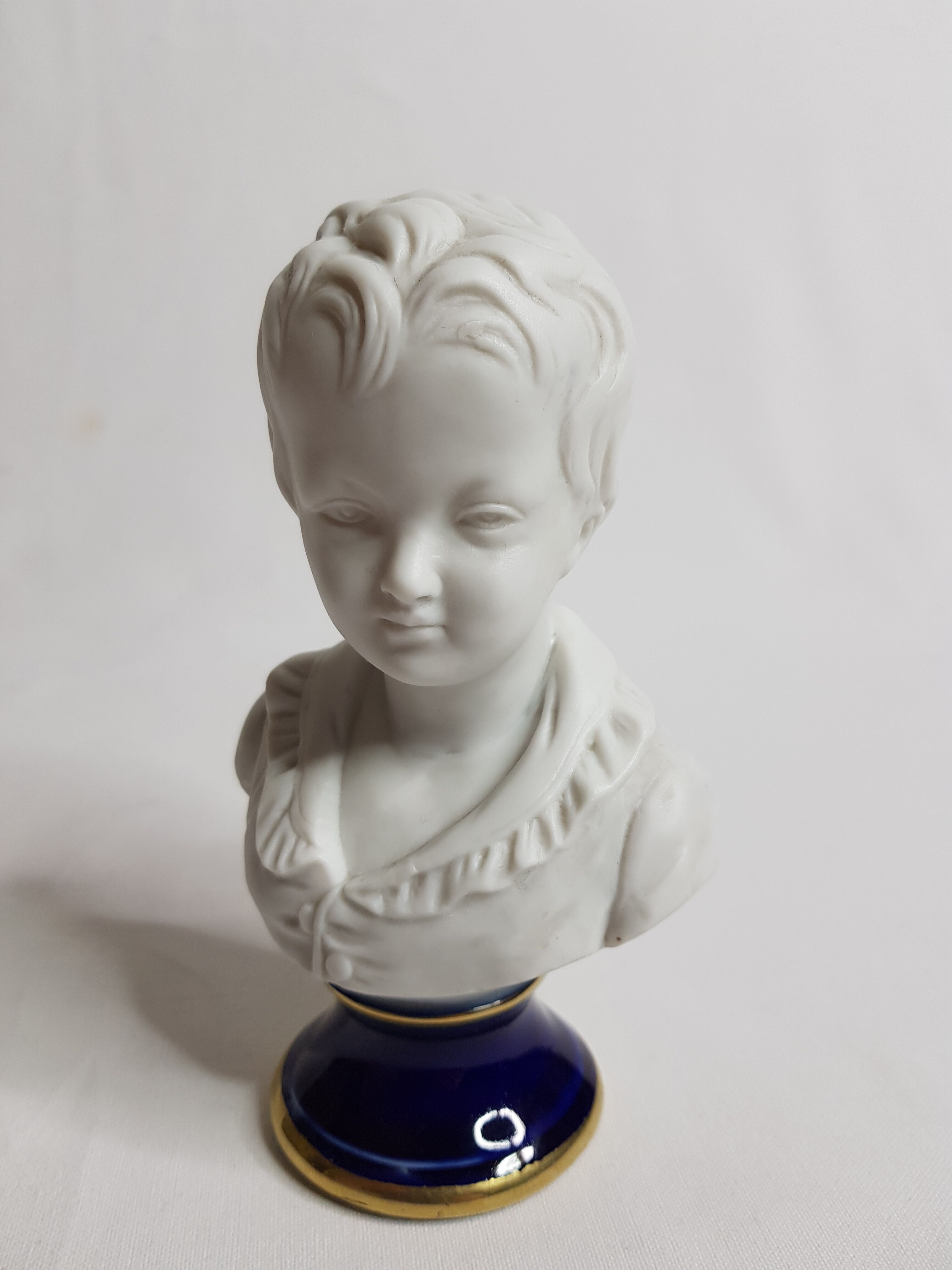 Porcelain biscuit busts, child, Alexandre Brongniart after Houdon