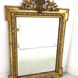 Louis XVI style mirror in wood and gilded stucco, 19th century