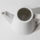 Vintage ceramic coffee pot or teapot from the 1980s, postmodern Memphis design, black and white triangles.