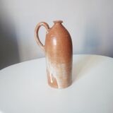 Vintage pitcher jug in sandstone