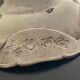 1 silver metal cup or pocket tray