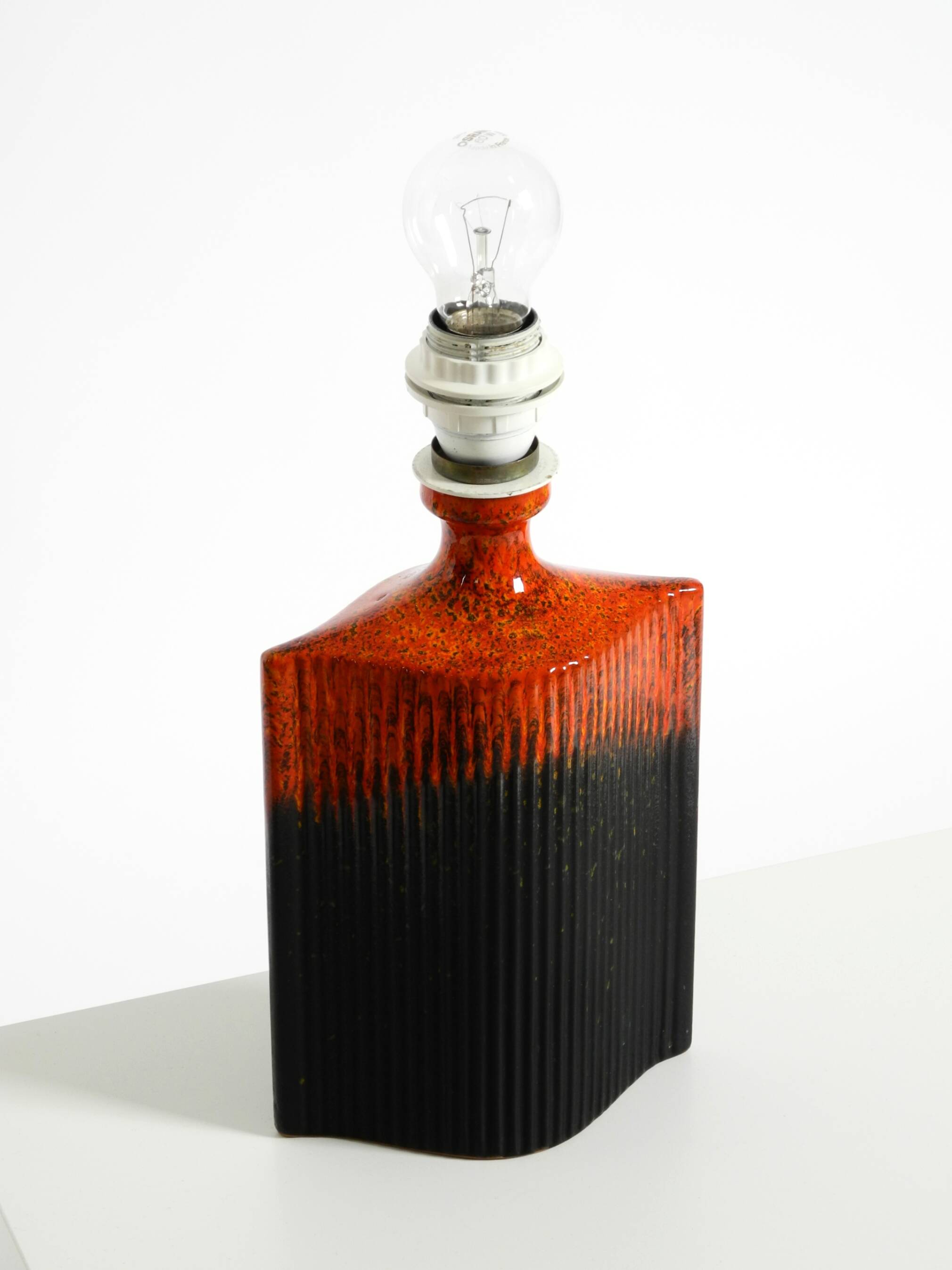 Unique 1960s ceramic table lamp in red and black by Kaiser Leuchten