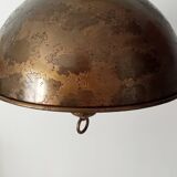 Rustic old wooden and brass suspension.