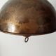 Rustic old wooden and brass suspension.