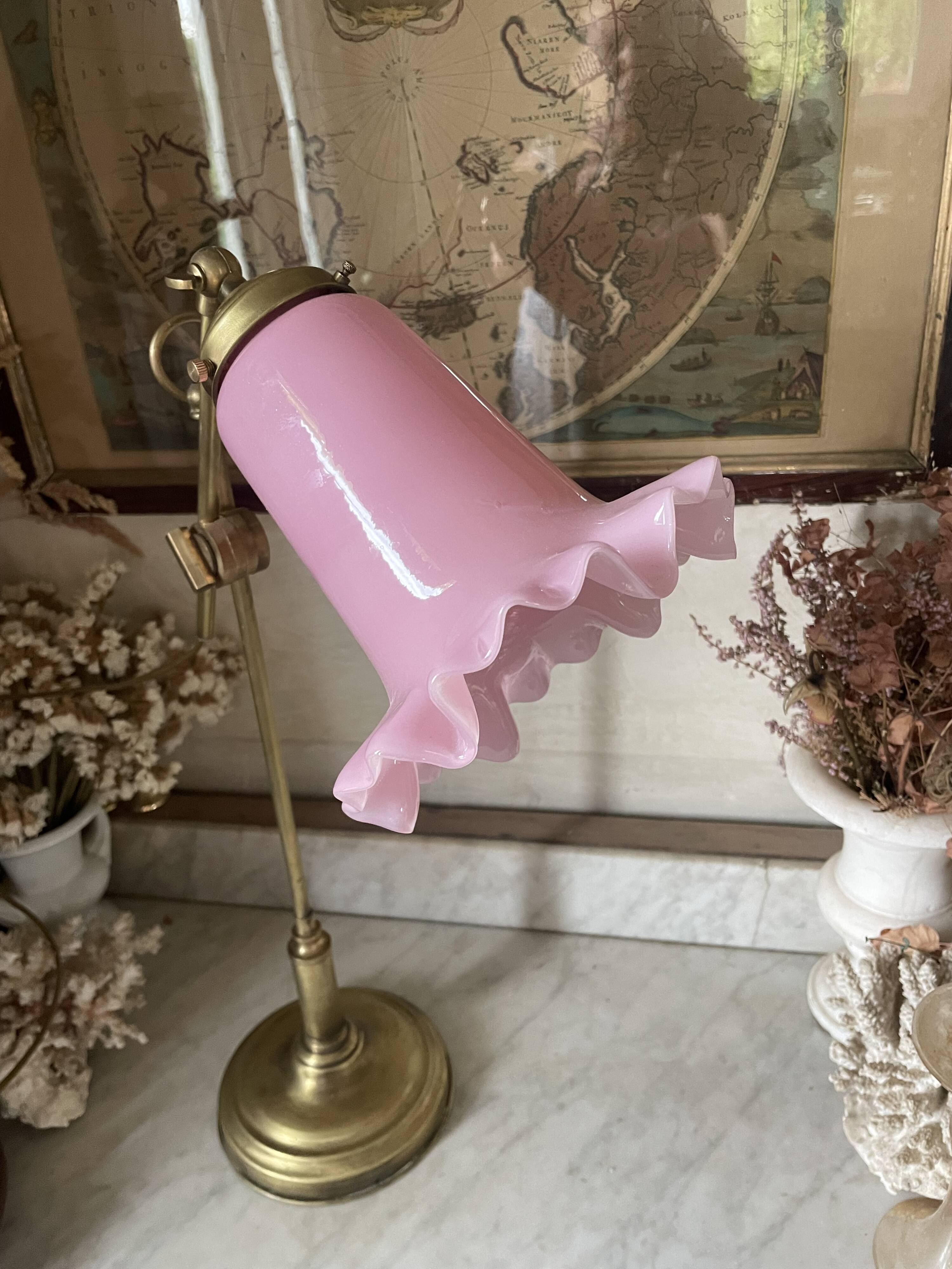 Large vintage lamp in brass with a pink opaline shade.