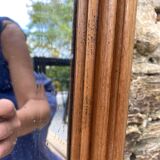 Beveled art deco mirror, carved wood