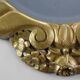 Oval Art Deco carved Gilt Wooden Mirror, France ca. 1920