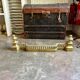 Fireplace fender in gilded bronze