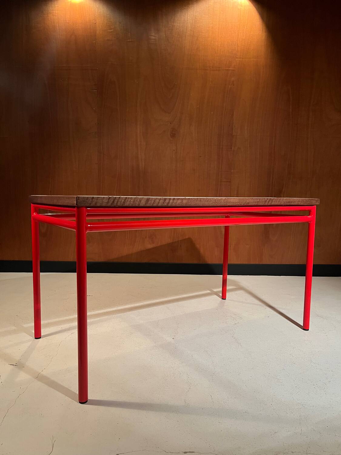 Custom modernist table, steel and earthenware.
