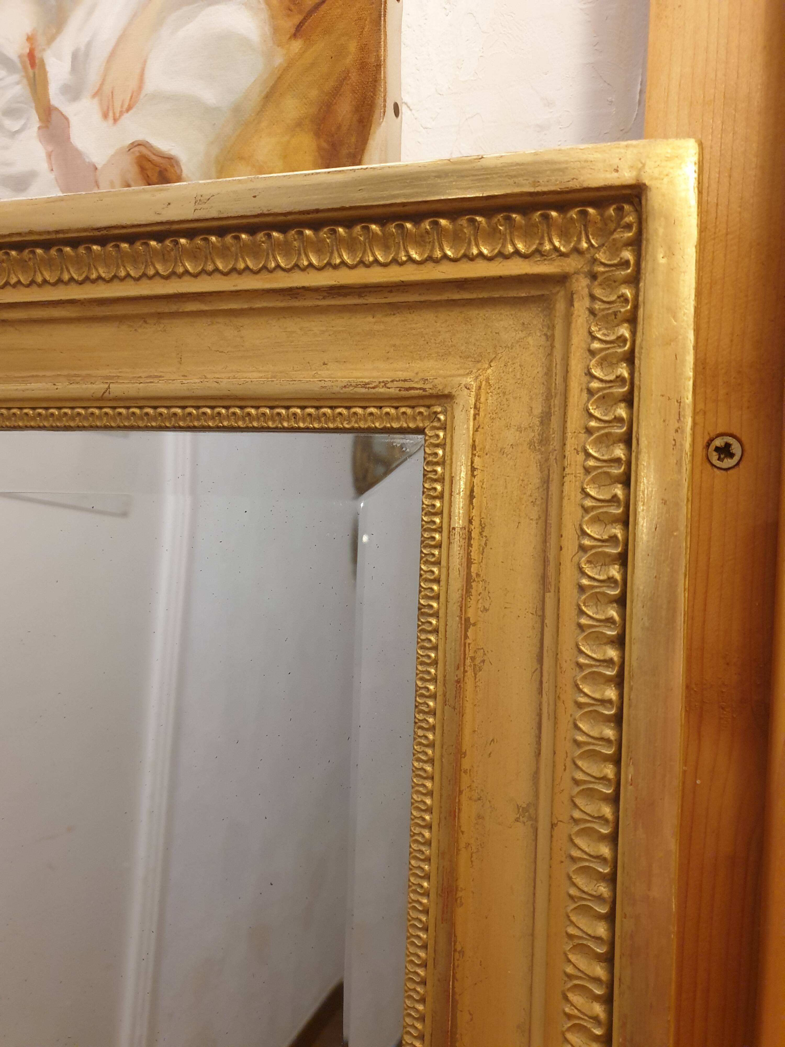 Large bevelled gold mirror