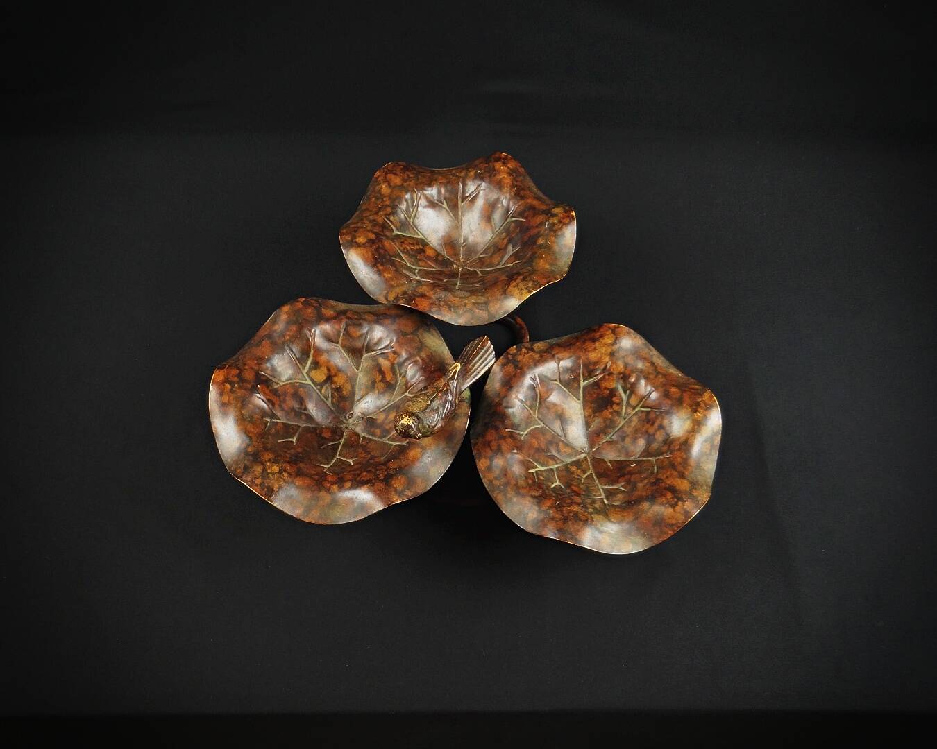 Three-tiered lotus leaf shaped patinated metal bird bath
