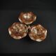 Three-tiered lotus leaf shaped patinated metal bird bath