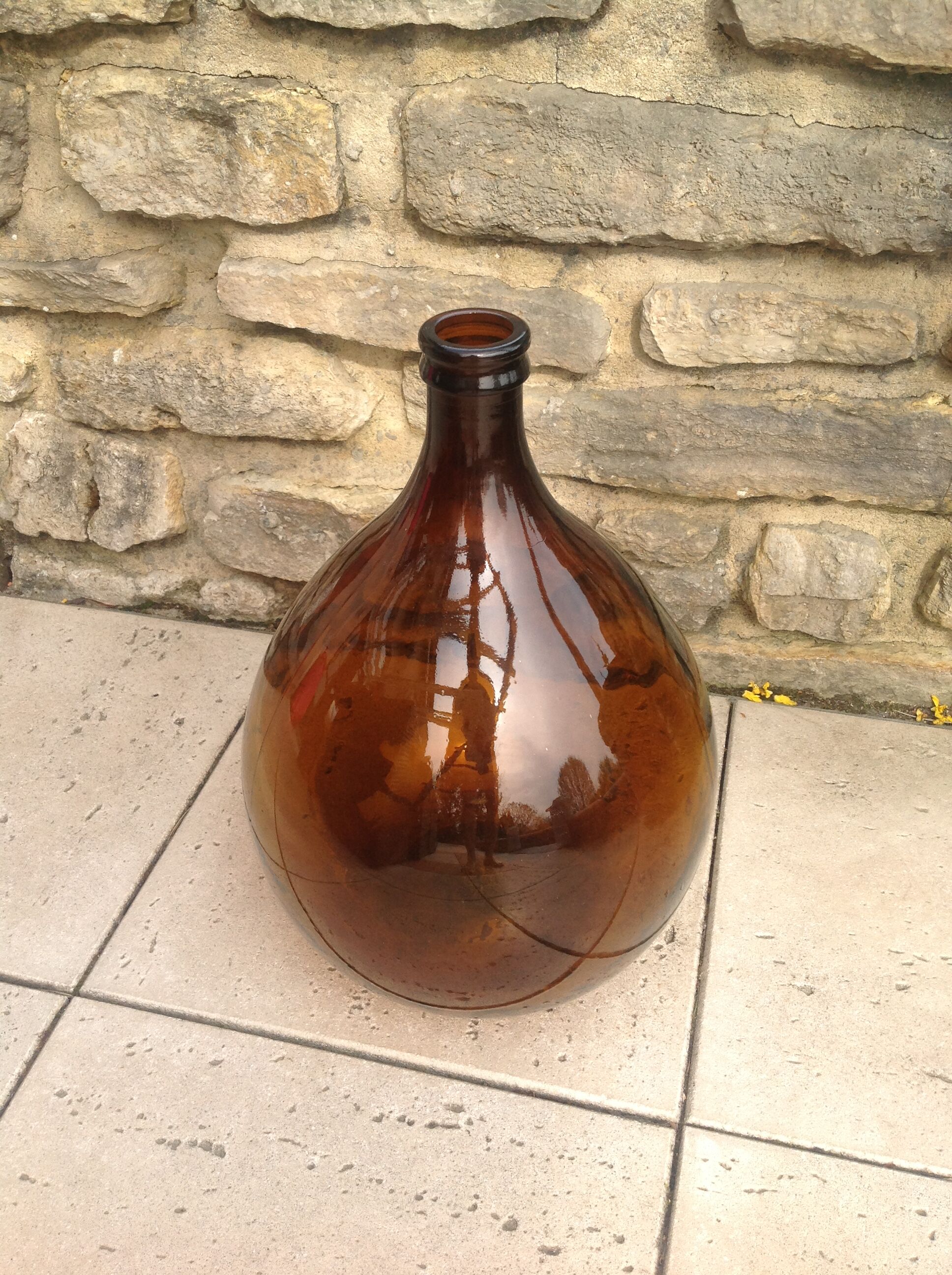 Old demijohn bonbonne smoked glass