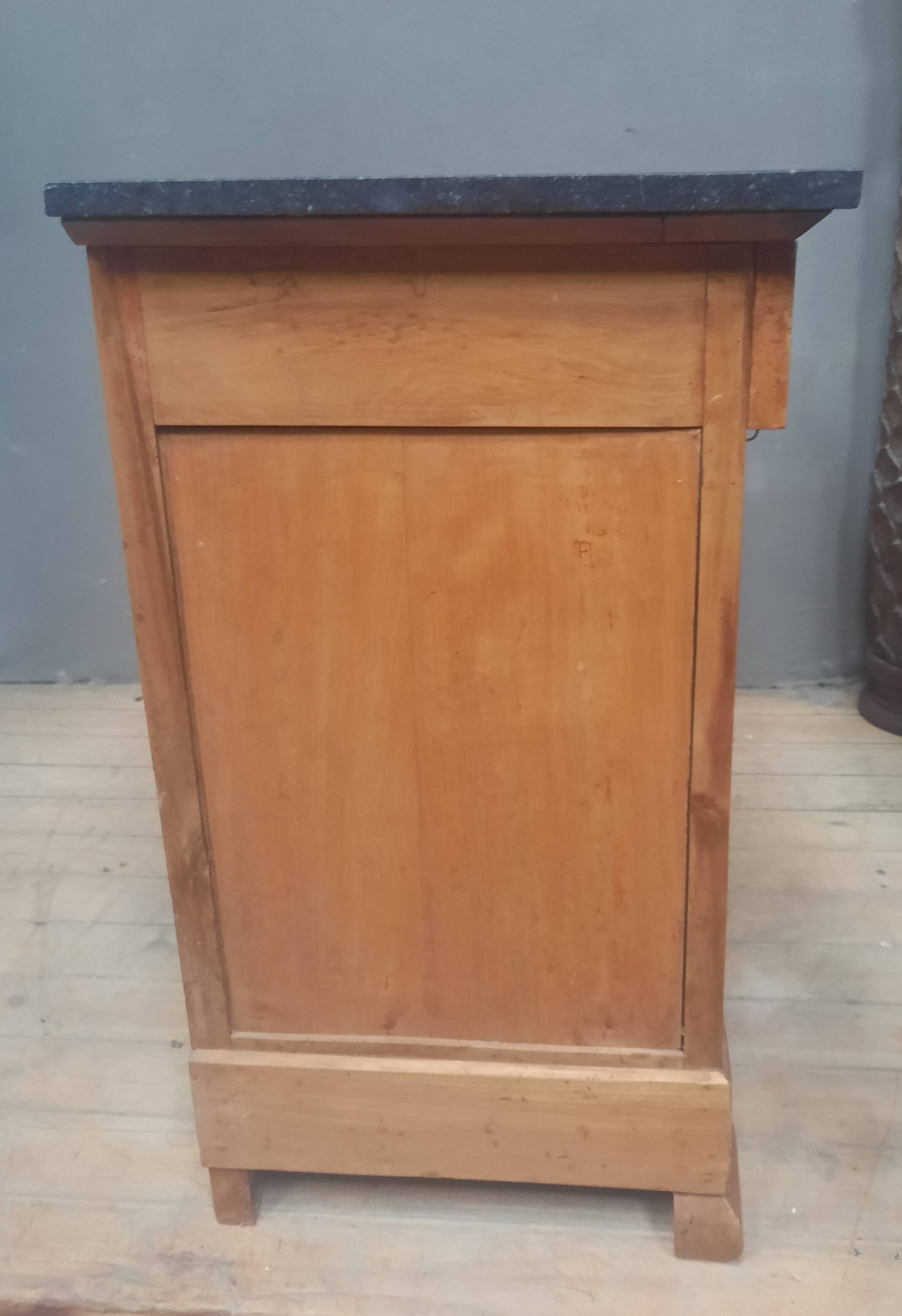 Nineteenth-century commode with marble top.
