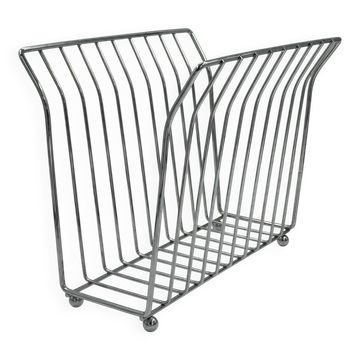 Vintage chrome wire magazine rack with ball feet.