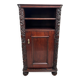 Art Nouveau cabinet with a shelf featuring distinctive floral sculptures.
