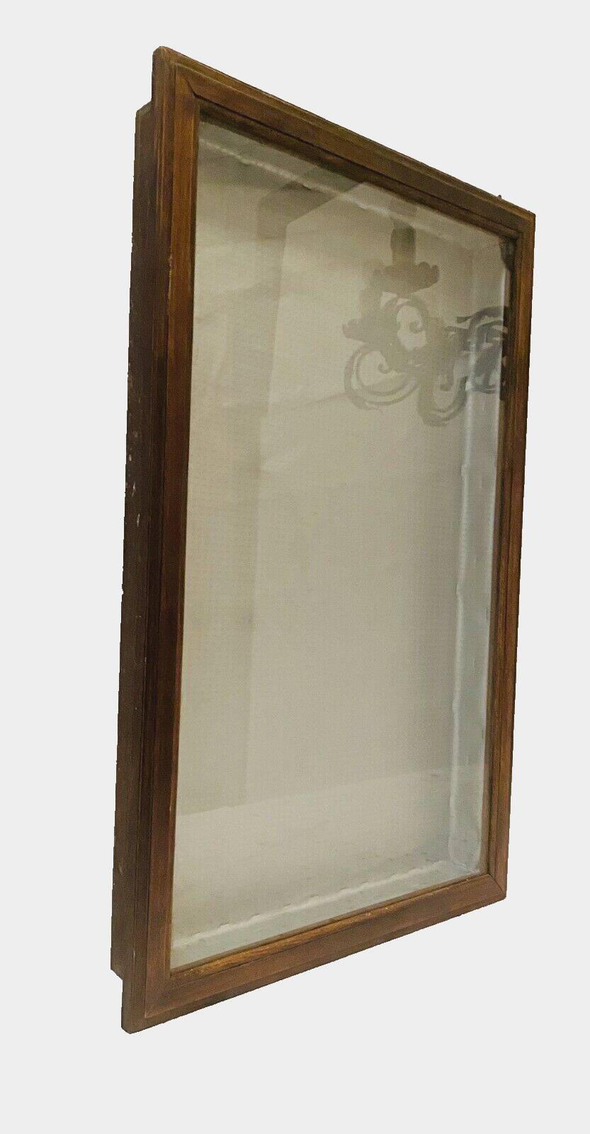 Wall display case with a solid oak door